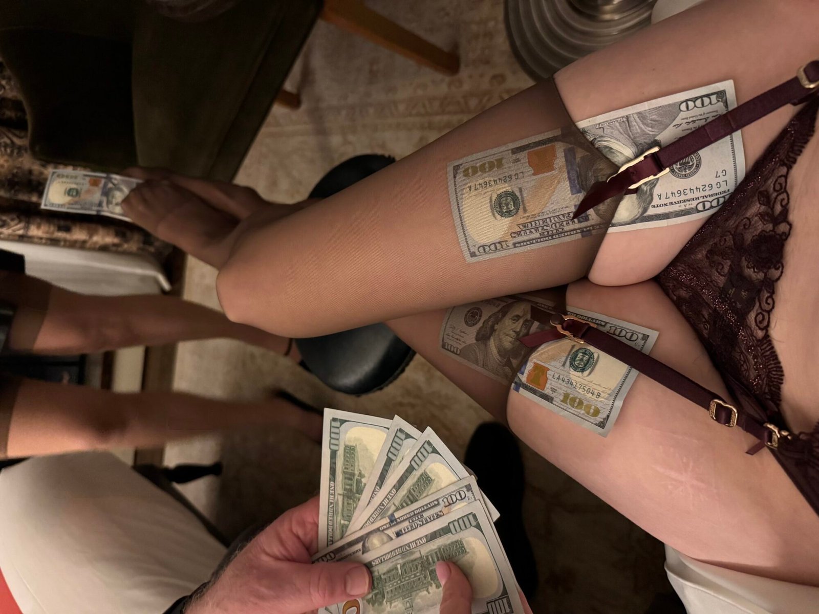 Mistress Blunt has hundred dollar bills in her stockings and takes more from her submissive