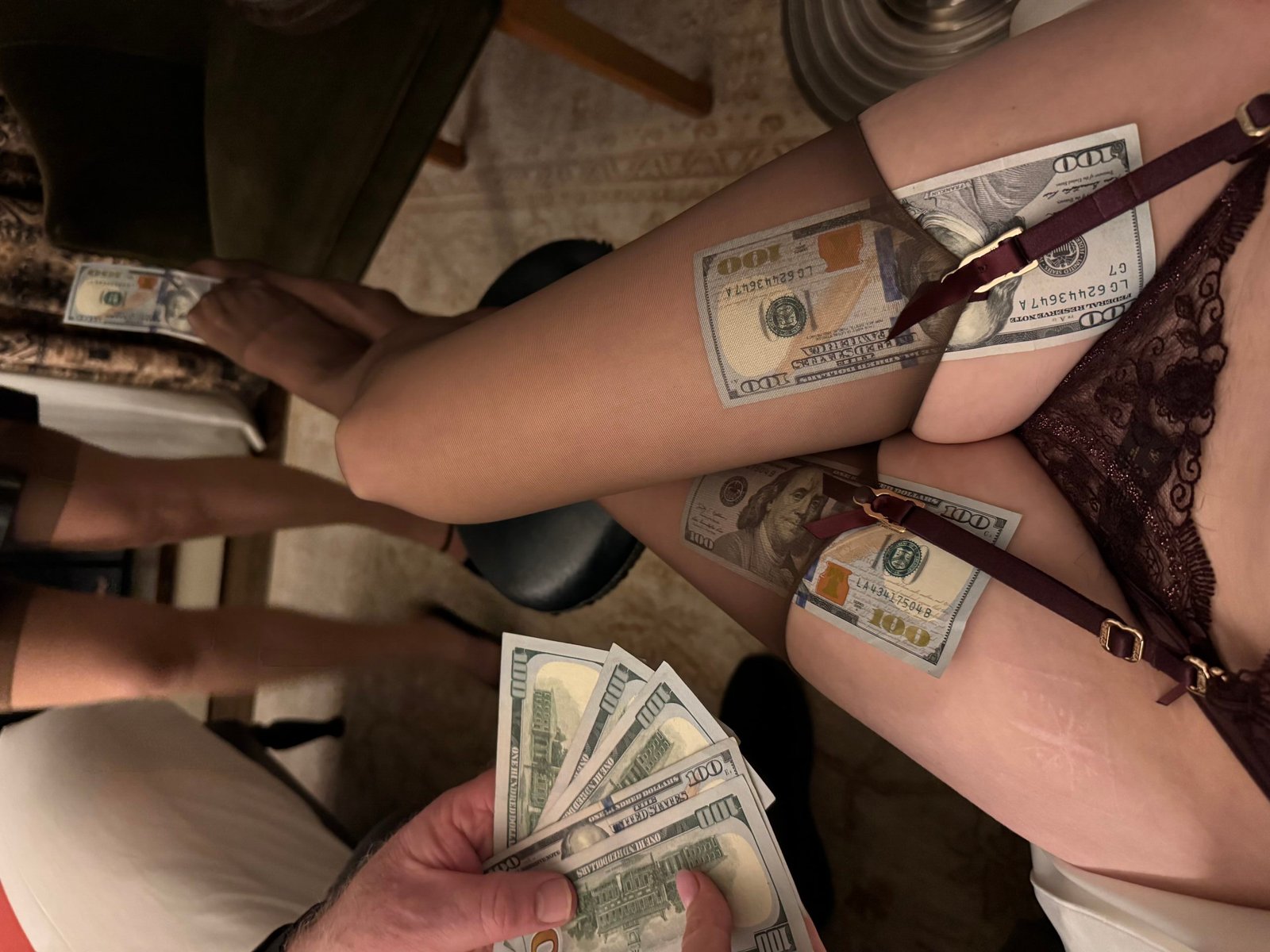 Mistress Blunt has hundred dollar bills in her stockings and takes more from her submissive